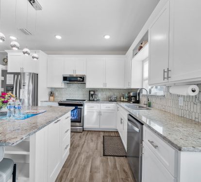 Fully equipped kitchen with double door fridge with freezer, Microwave, Oven and small appliances Rice cooker, bread toaster, kettle, blender, pots and pans, cutleries. Plastic dinnerware for kids.