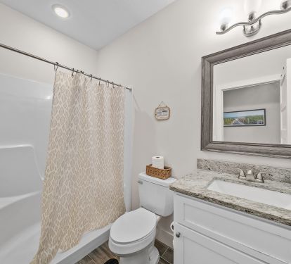 Bath room with essentials Shampoo, Conditioner, Body wash, Hair dryer, towels