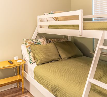 Full bottom bed and secure bunk above.  Who has the TV remote?