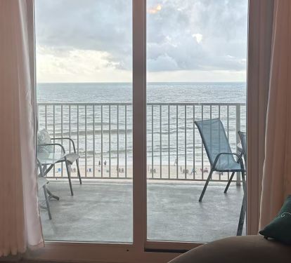 Balcony attached to room.