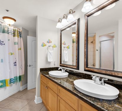 Bedrooms 3 and 4 share a jack and Jill bath with double sinks. 