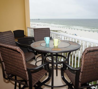 Our balcony has 2 sets of tables with chairs so everyone can enjoy the sunsets! 