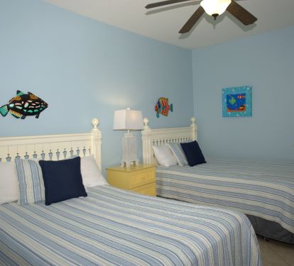 Our large third bedroom has 2 queen beds!