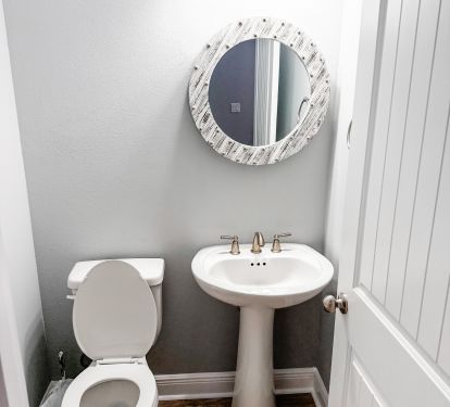 Guest Half Bath Located Upstairs 
