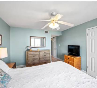 TV with streaming services and large dresser
