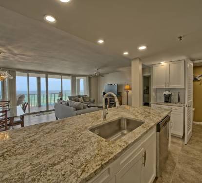 Modern remodeled kitchen with oversized island beautiful granite with views