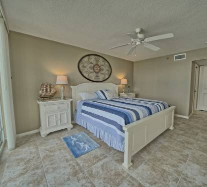 One of two large masters with new paint, flooring, linens, and more.