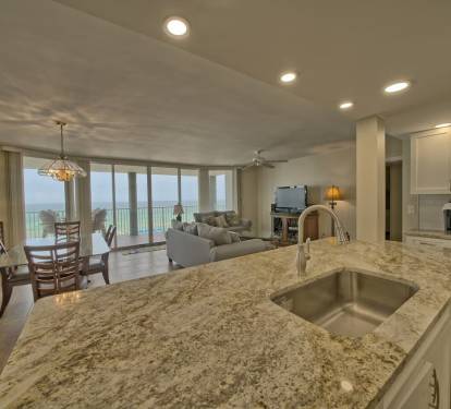 Large island sink with garbage disposal. Coffee bar with Keurig and Cuisinart