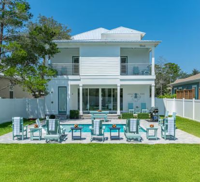 Enjoy grilling up fresh-caught seafood on Encore's included grill in its fully fenced, private backyard.