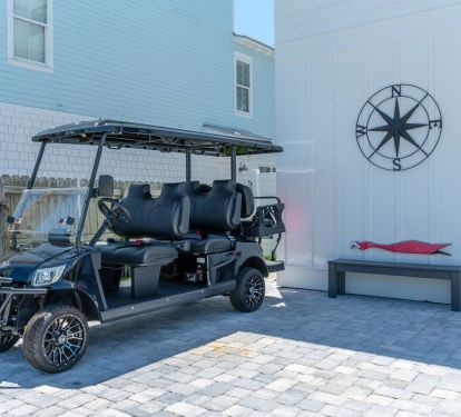 includes a 2024 6 seat golf cart, 2 paddleboards and 1 gas grill (propane included).