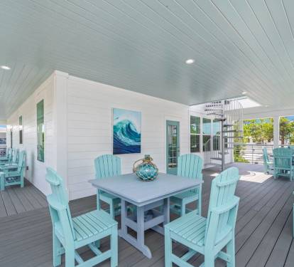 Experience the coastal breeze and enjoy outdoor dining on the top floor balcony!