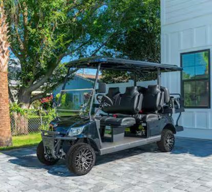 includes a 2024 6 seat golf cart, 2 paddleboards and 1 gas grill (propane included).