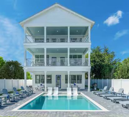 features a private pool in a fully fenced back yard