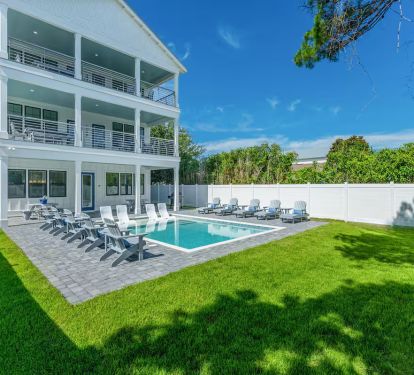 private pool with spacious, fully fenced back yard