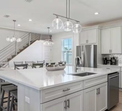 Glimmer's kitchen island is perfect for quick grab and go meals before hitting the beach!