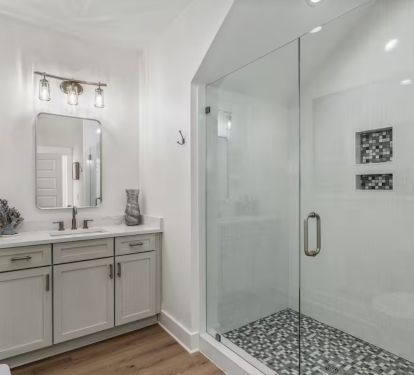 1st Floor Hall Full Bath Pic 2: quartz vanity and frameless glass shower