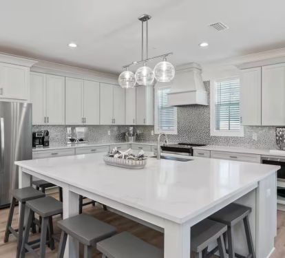 Glimmer's kitchen island is perfect for quick grab and go meals before hitting the beach!