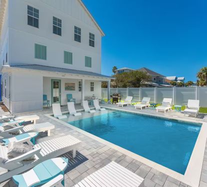 Soak up the sun in Glimmer's private, fenced in (seasonally heated) pool area!