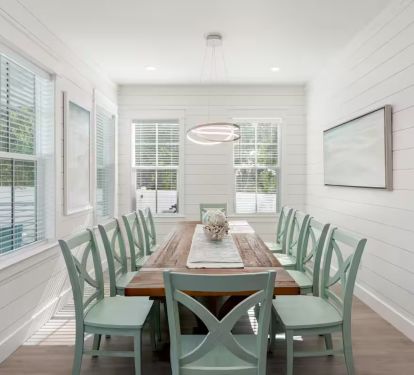 Symphony's dining table has space for 10, plus 4 seats at the kitchen island