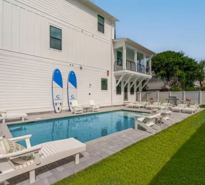 Features a private pool in a fully fenced side yard