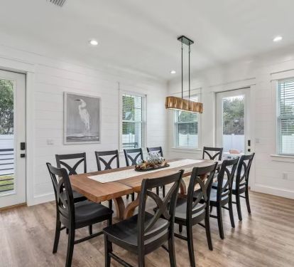 Cypress dining room table has seating for 10 guests, plus 5 more.