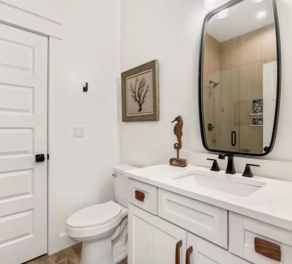 Bedroom 1 Private Bath Pic 1: quartz vanity with frameless glass shower