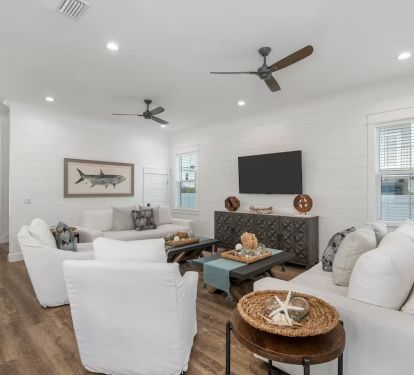 features a perfect blend of coastal comfort and designer grade furnishings!