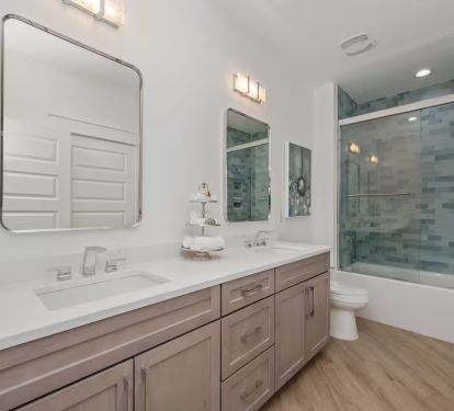 Bedroom 1 Bath Pic 1: Double quartz vanity with shower tub combo