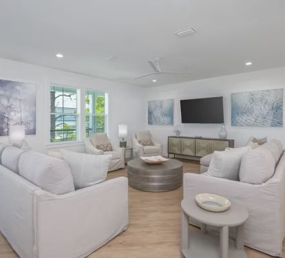 Three living room areas give plenty of space for the whole family to relax!