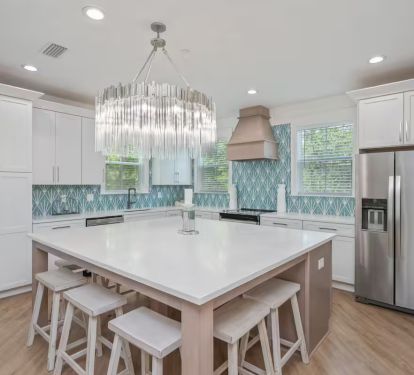 Fully stocked kitchen for all your family's cooking needs! Harmony's kitchen island is perfect grab and go meals or family game nights!