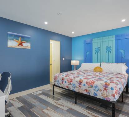 Step into a bold, designer living room where vibrant color meets luxury.