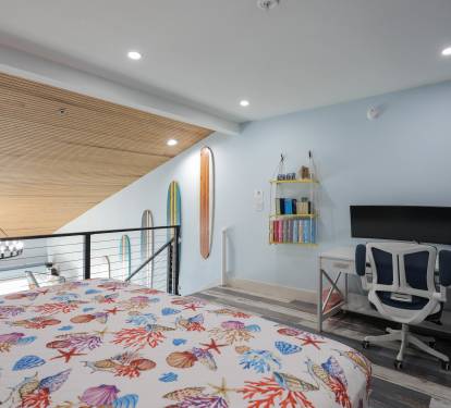 Step into a bold, designer living room where vibrant color meets luxury.