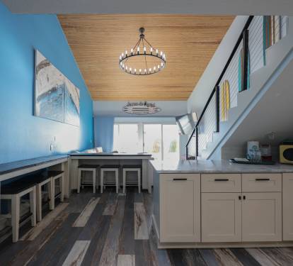 Step into a bold, designer living room where vibrant color meets luxury.