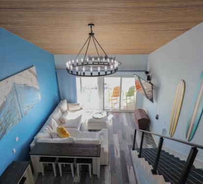 Step into a bold, designer living room where vibrant color meets luxury.