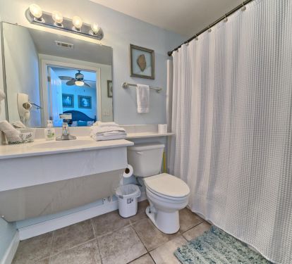 Guest bathroom with tub/shower combo. Fully equipped. 