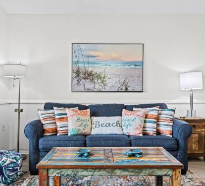 Sofa with Queen pull out with charging outlets in lamp.