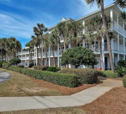 Exterior leading to beach entrance on east end of the building