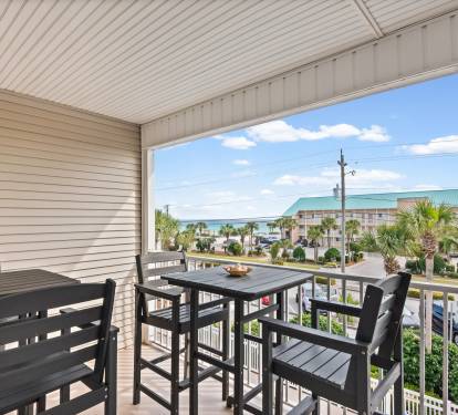 Both Balcony High Top tables and 4 chairs