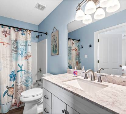 Full Bath with large vanity and tub/shower combo