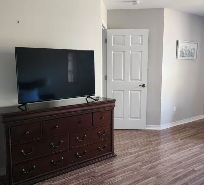 Big screen tv in the bedroom