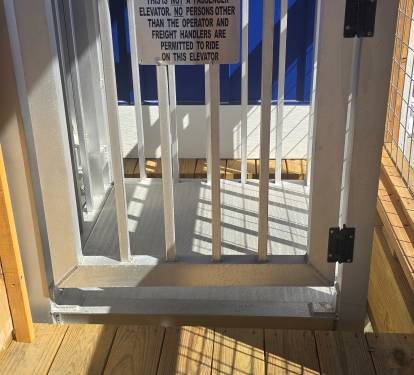 Lift from deck safety gate open