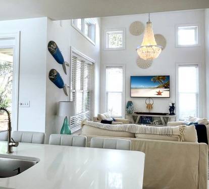 Put together a snack or get a drink on this spacious island surrounded with windows and views of the yard