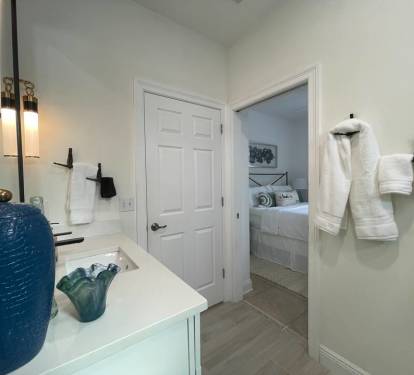 This downstairs bath is also accessible from the hallway.