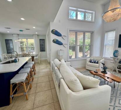 An open living area is ideal for family and friend get-togethers with plenty of comfortable seating