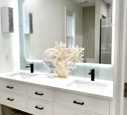 Vanity with double sinks and convenient storage, the backlit mirror also offers anti fog. USB plugs installed by each sink. We provide blow dryers in every bathroom. Newly remodeled, art and decorative touches will be completed later this year.
