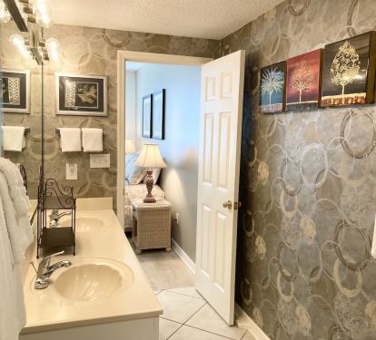 Even the master bathroom has beautiful artwork.