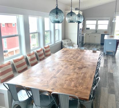 This custom made knotty alder table seats everyone!