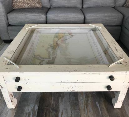 This beautiful old table holds a map of the Gulf!