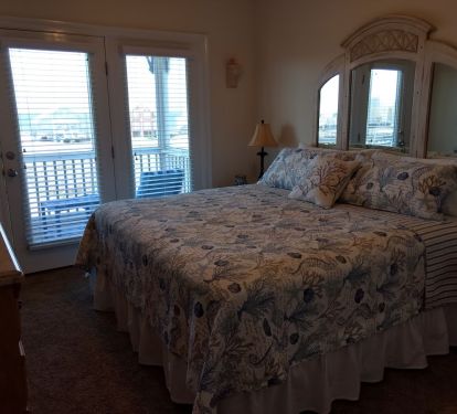 Second floor (King) bedroom; Gulf view from French doors onto balcony