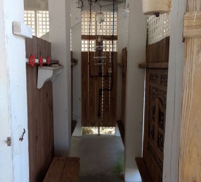 Shower with hot/cold water; roomy changing area